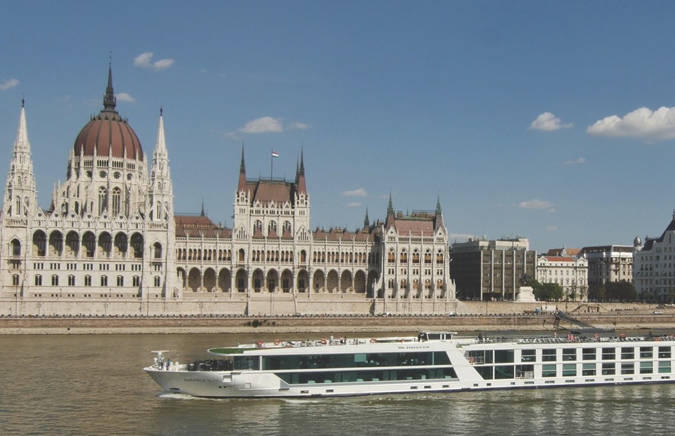 The Emerald Sun sails by Budapest