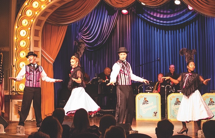 Performers ham it up during an old-timey music hall show aboard the American Queen Mississippi River cruise