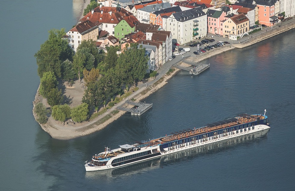 An AmaWaterways ship passes Passau, Germany
